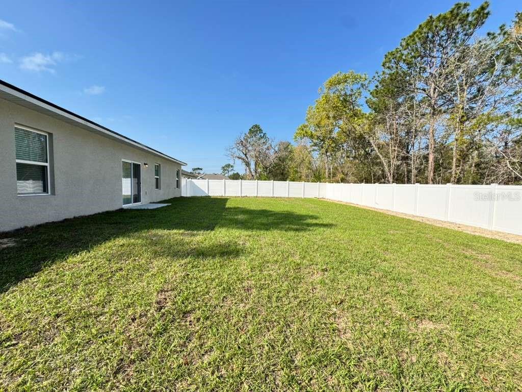 16054 Southwest 55th Avenue Road Ocala, FL 34473 - Photo 56 of 58 a view of an outdoor space and a yard