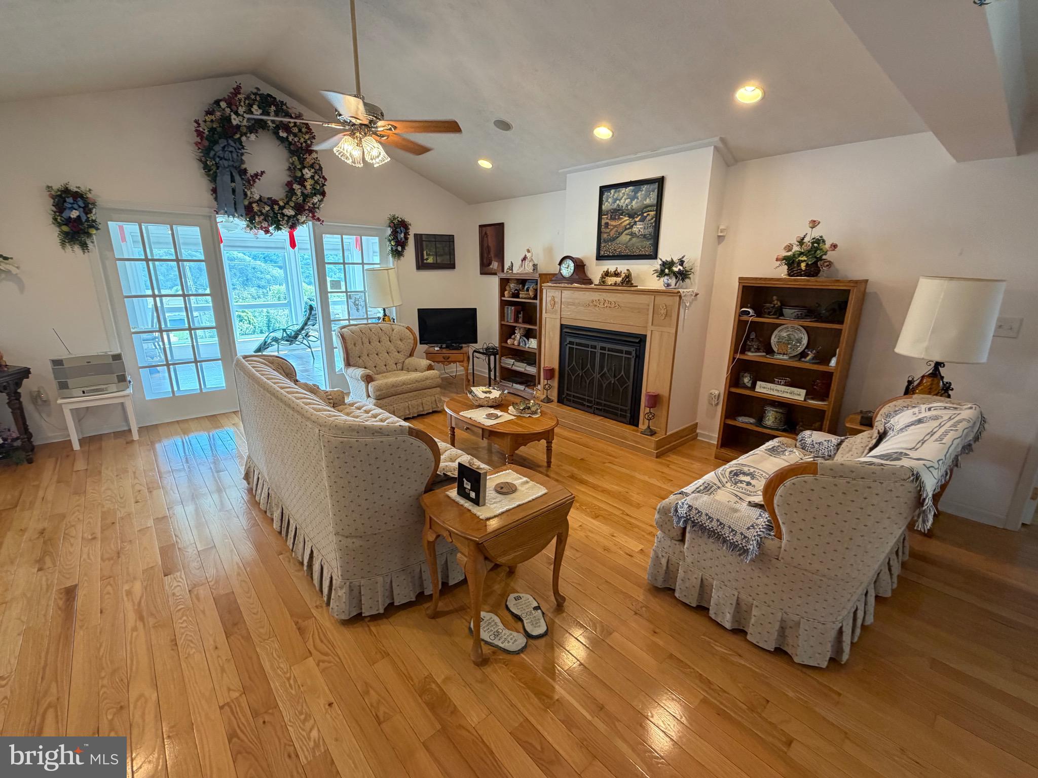1565 Liberty Street Keyser, WV 26726 - Photo 13 of 95 a living room with furniture and a wooden floor