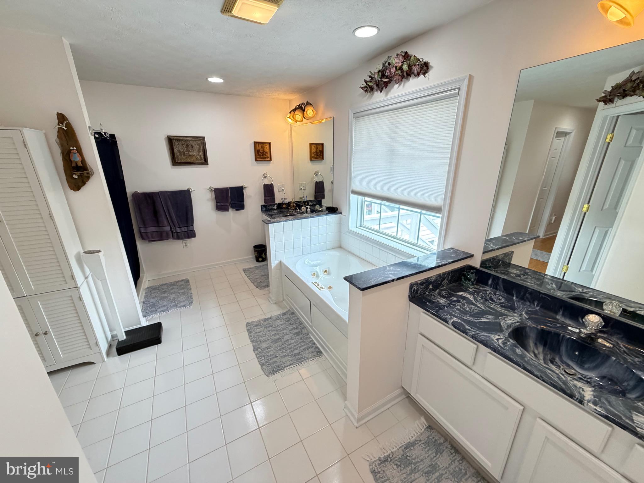 1565 Liberty Street Keyser, WV 26726 - Photo 21 of 95 a kitchen with stainless steel appliances granite countertop a stove a sink and a refrigerator