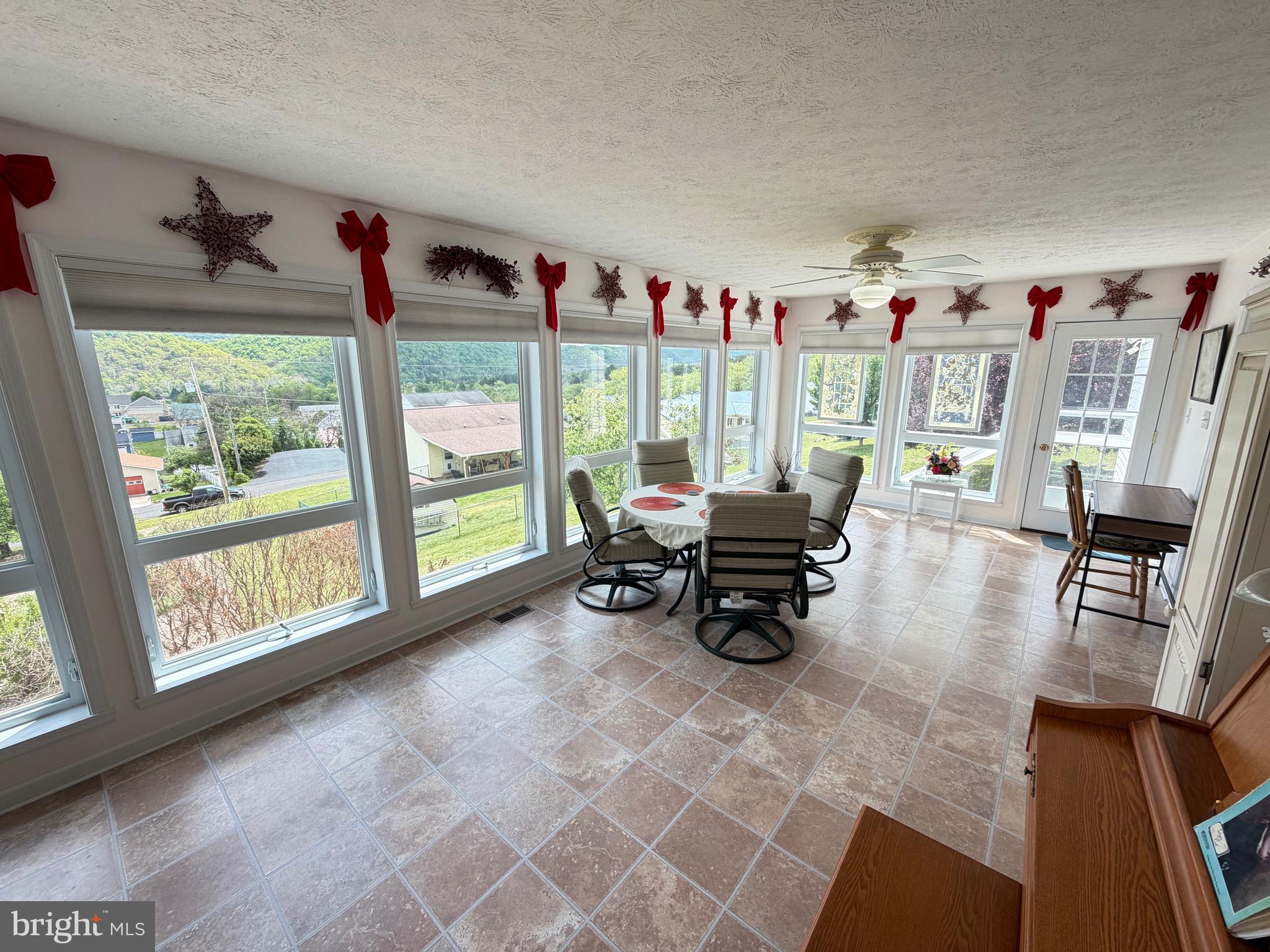 1565 Liberty Street Keyser, WV 26726 - Photo 33 of 95 a living room with furniture and a large window