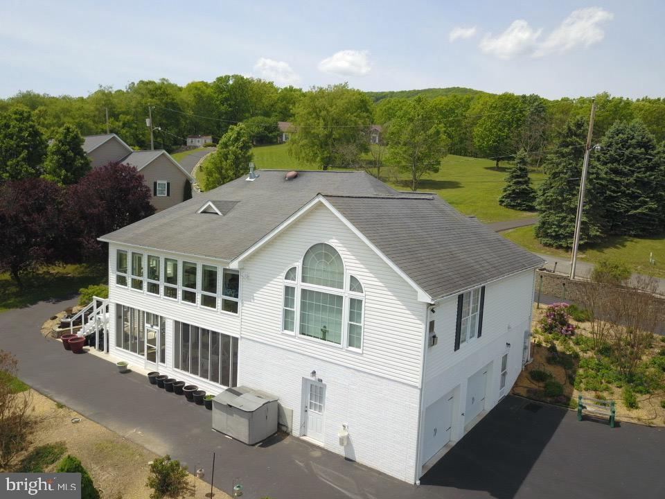 1565 Liberty Street Keyser, WV 26726 - Photo 55 of 95 a aerial view of a house with a yard