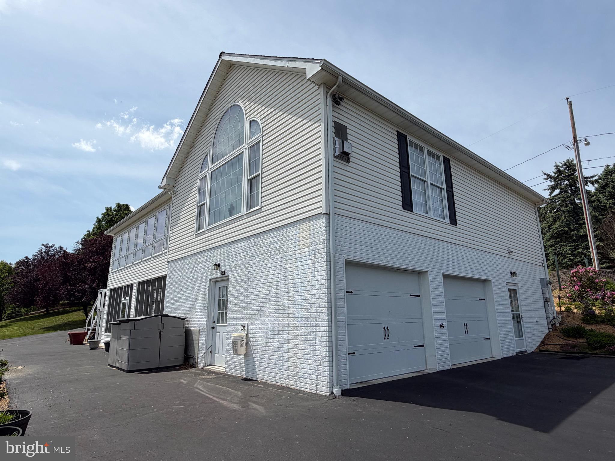 1565 Liberty Street Keyser, WV 26726 - Photo 68 of 95 a front view of a house with a garage