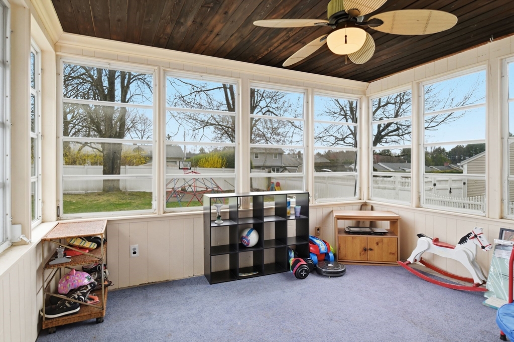 244 Lower Westfield Road Holyoke, MA 01040 - Photo 13 of 39 a room with furniture and a large window