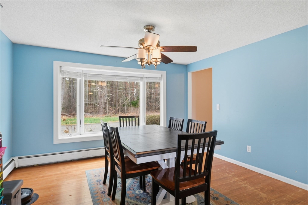 244 Lower Westfield Road Holyoke, MA 01040 - Photo 14 of 39 a view of a dining room with furniture window and outside view