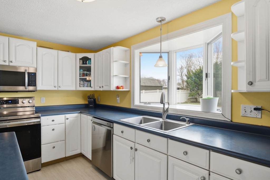 244 Lower Westfield Road Holyoke, MA 01040 - Photo 20 of 39 a kitchen with sink and window