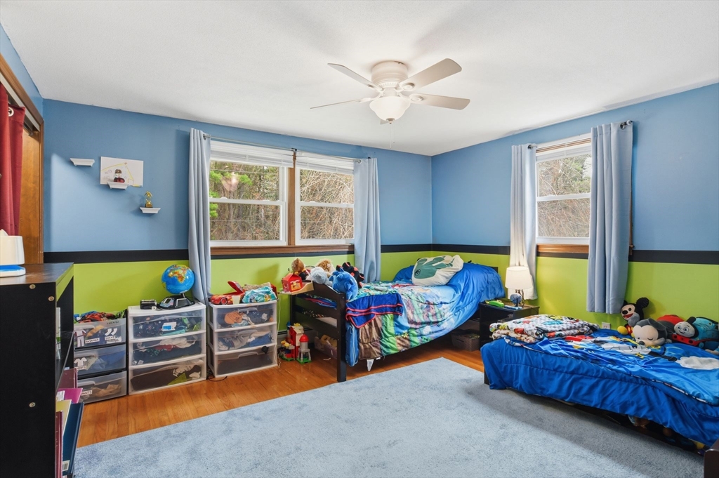 244 Lower Westfield Road Holyoke, MA 01040 - Photo 26 of 39 a bed room with furniture and a window