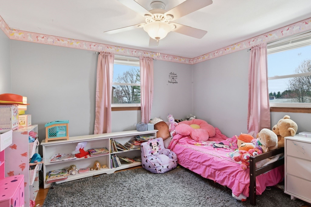 244 Lower Westfield Road Holyoke, MA 01040 - Photo 28 of 39 a bedroom with bed and a window