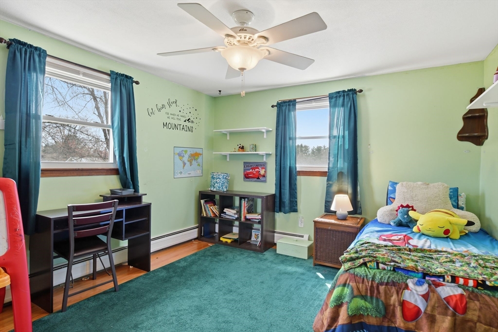 244 Lower Westfield Road Holyoke, MA 01040 - Photo 31 of 39 a bedroom with two beds and a desk