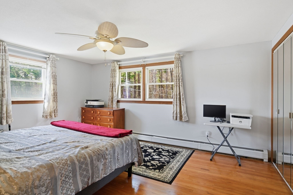 244 Lower Westfield Road Holyoke, MA 01040 - Photo 33 of 39 a bedroom with a bed and window