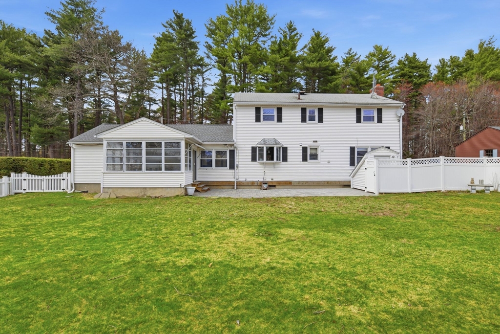 244 Lower Westfield Road Holyoke, MA 01040 - Photo 38 of 39 a front view of a house with a garden and trees