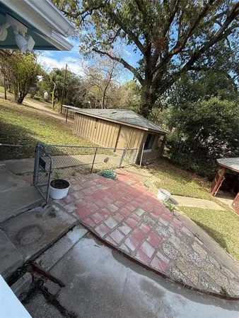 a backyard with furniture and window