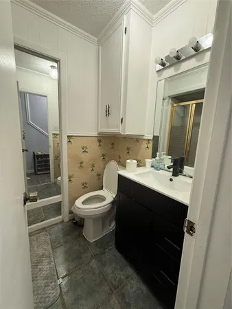 a view of a car parked on the side of the road