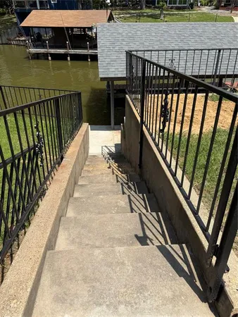 a view of balcony with wooden floor