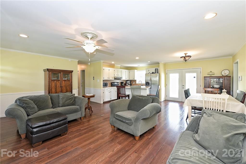 1721 Rock Rest Road Wingate, NC 28174 - Photo 14 of 47 a living room with furniture and a large window