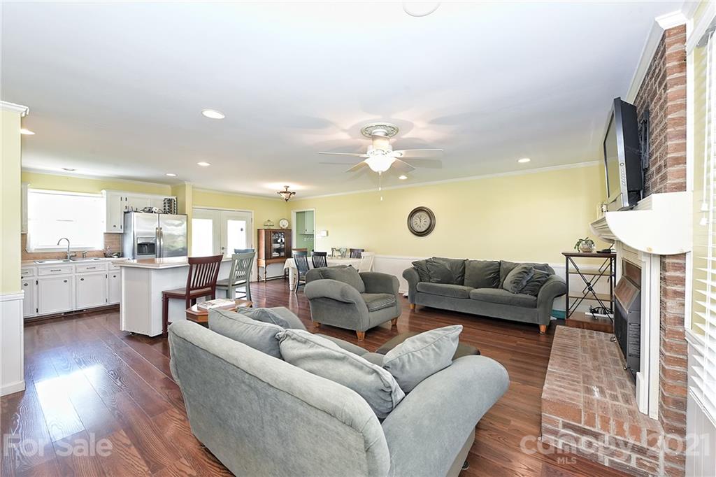 1721 Rock Rest Road Wingate, NC 28174 - Photo 15 of 47 a living room with furniture and a view of kitchen
