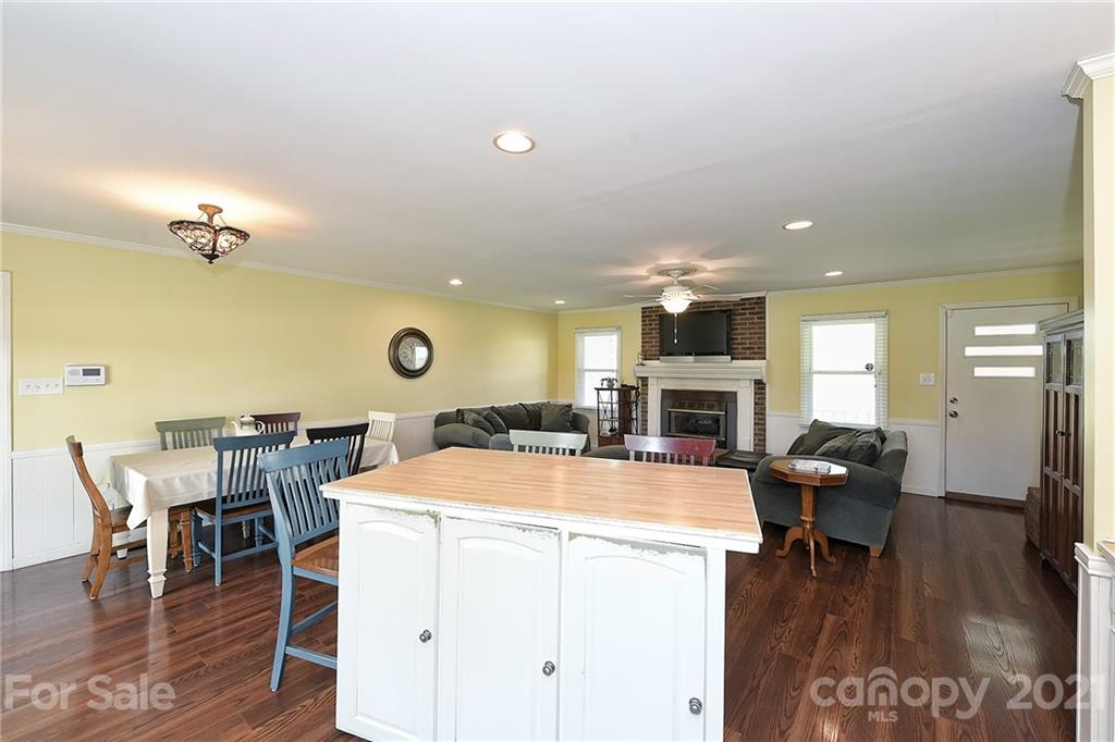 1721 Rock Rest Road Wingate, NC 28174 - Photo 23 of 47 a view of a dining room with furniture window and wooden floor
