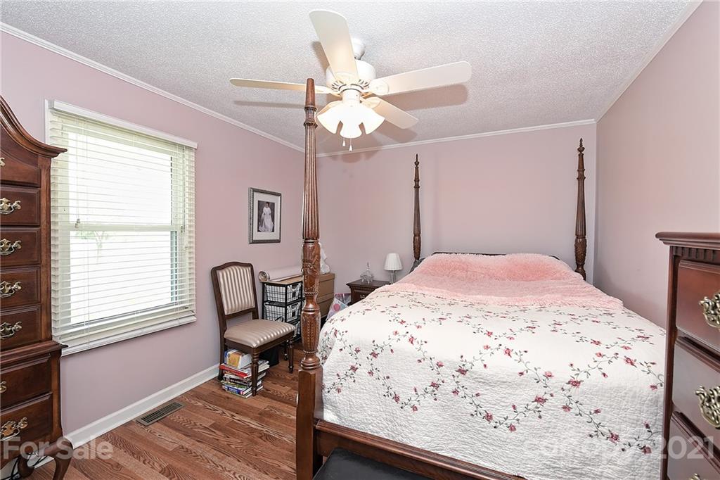 1721 Rock Rest Road Wingate, NC 28174 - Photo 28 of 47 a bedroom with a bed and a window