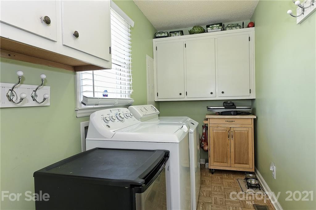 1721 Rock Rest Road Wingate, NC 28174 - Photo 31 of 47 a utility room with dryer and washer