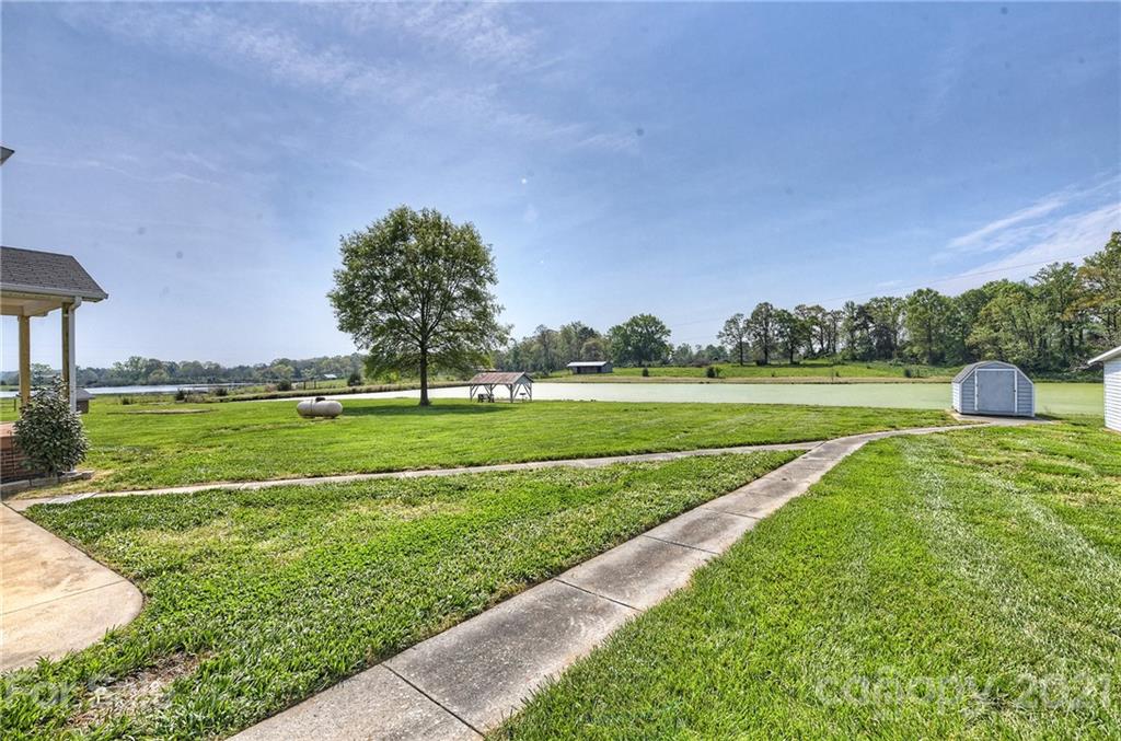 1721 Rock Rest Road Wingate, NC 28174 - Photo 37 of 47 a view of a golf course with a big yard