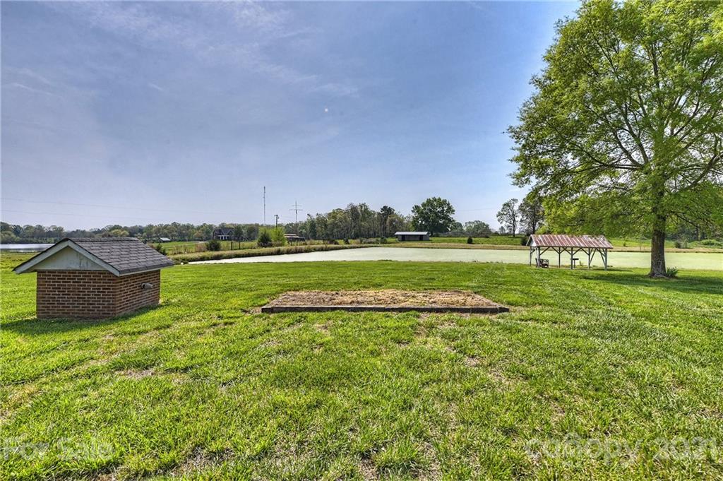 1721 Rock Rest Road Wingate, NC 28174 - Photo 41 of 47 a view of a house with a big yard