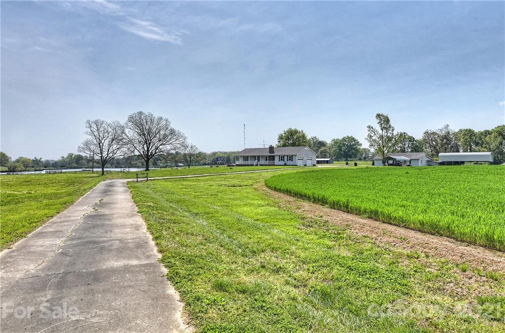 1721 Rock Rest Road Wingate, NC 28174 - Photo 45 of 47 a view of a golf course with a garden