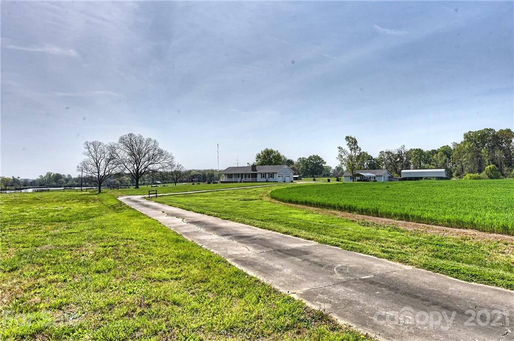 1721 Rock Rest Road Wingate, NC 28174 - Photo 46 of 47 a view of a golf course with a garden