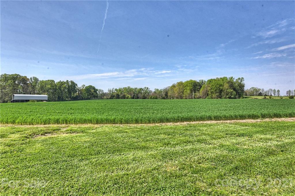 1721 Rock Rest Road Wingate, NC 28174 - Photo 47 of 47 a view of a green field with clear sky