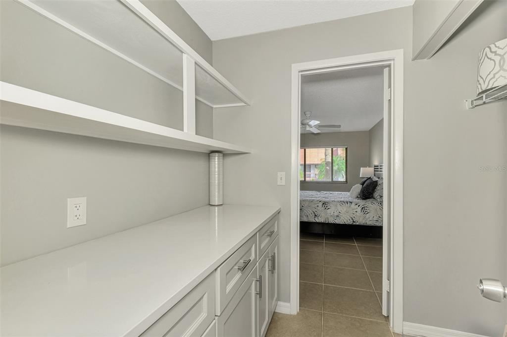 1618 Stickney Point Road, Unit 1618202 Sarasota, FL 34231 - Photo 33 of 58 a view of storage and utility room