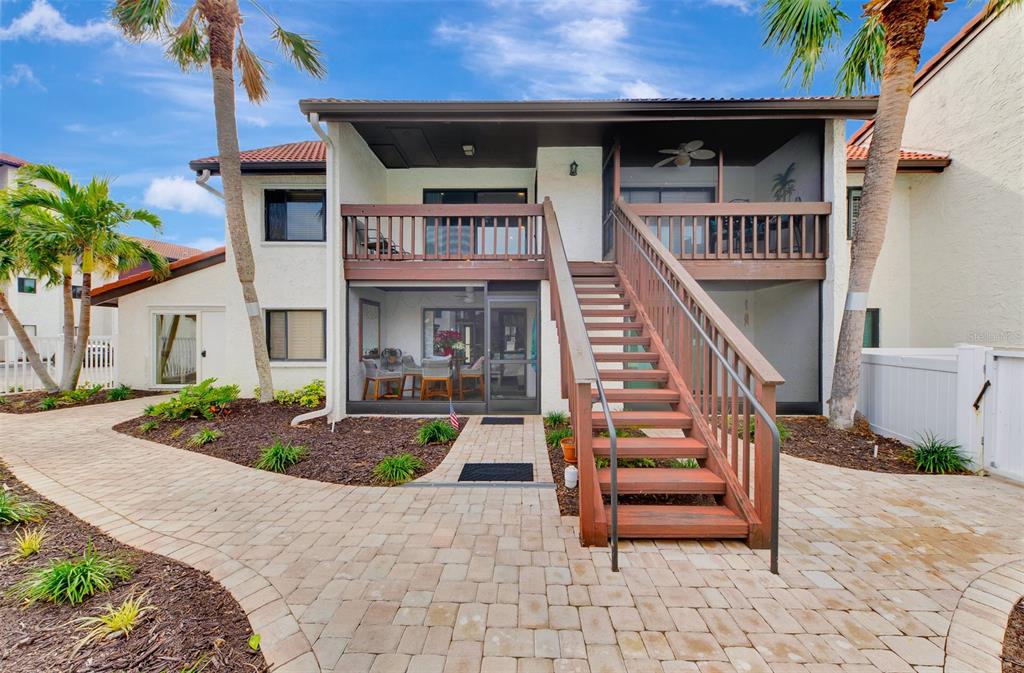 1618 Stickney Point Road, Unit 1618202 Sarasota, FL 34231 - Photo 41 of 58 a front view of a house with entertaining space