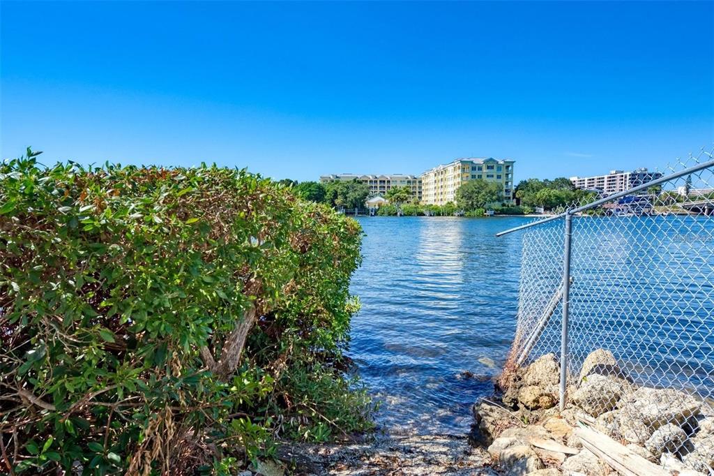 1618 Stickney Point Road, Unit 1618202 Sarasota, FL 34231 - Photo 58 of 58 a view of a lake from a terrace