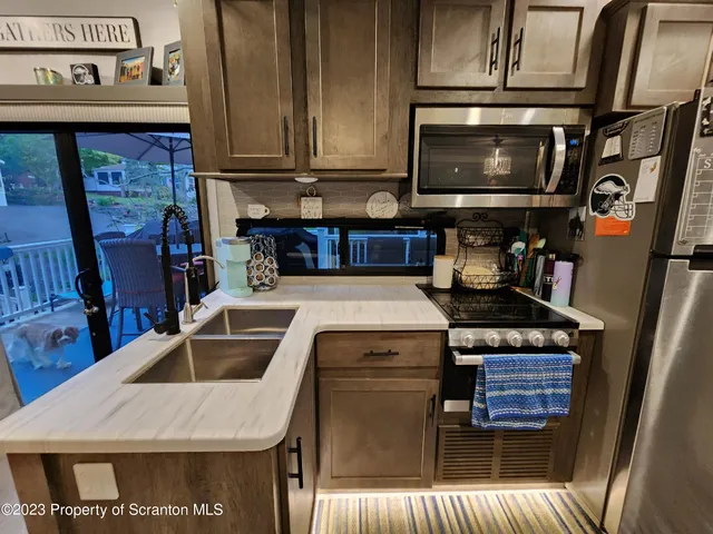 a bedroom with a bed and a mirror