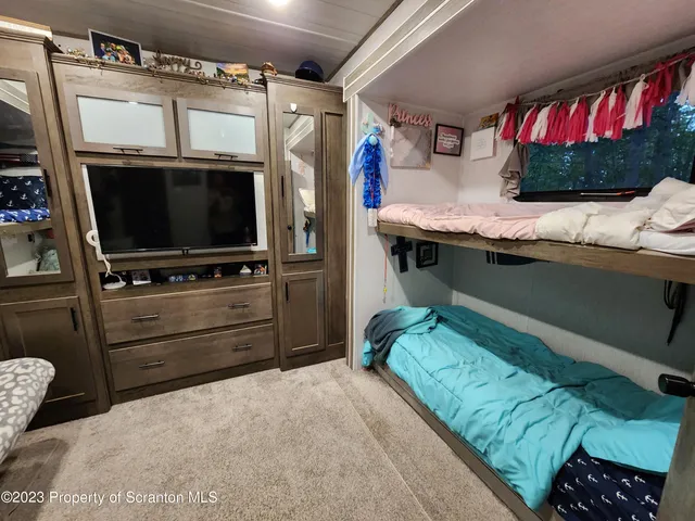 a bathroom with a sink toilet and tub