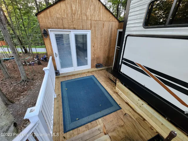 an outdoor space with furniture and umbrella