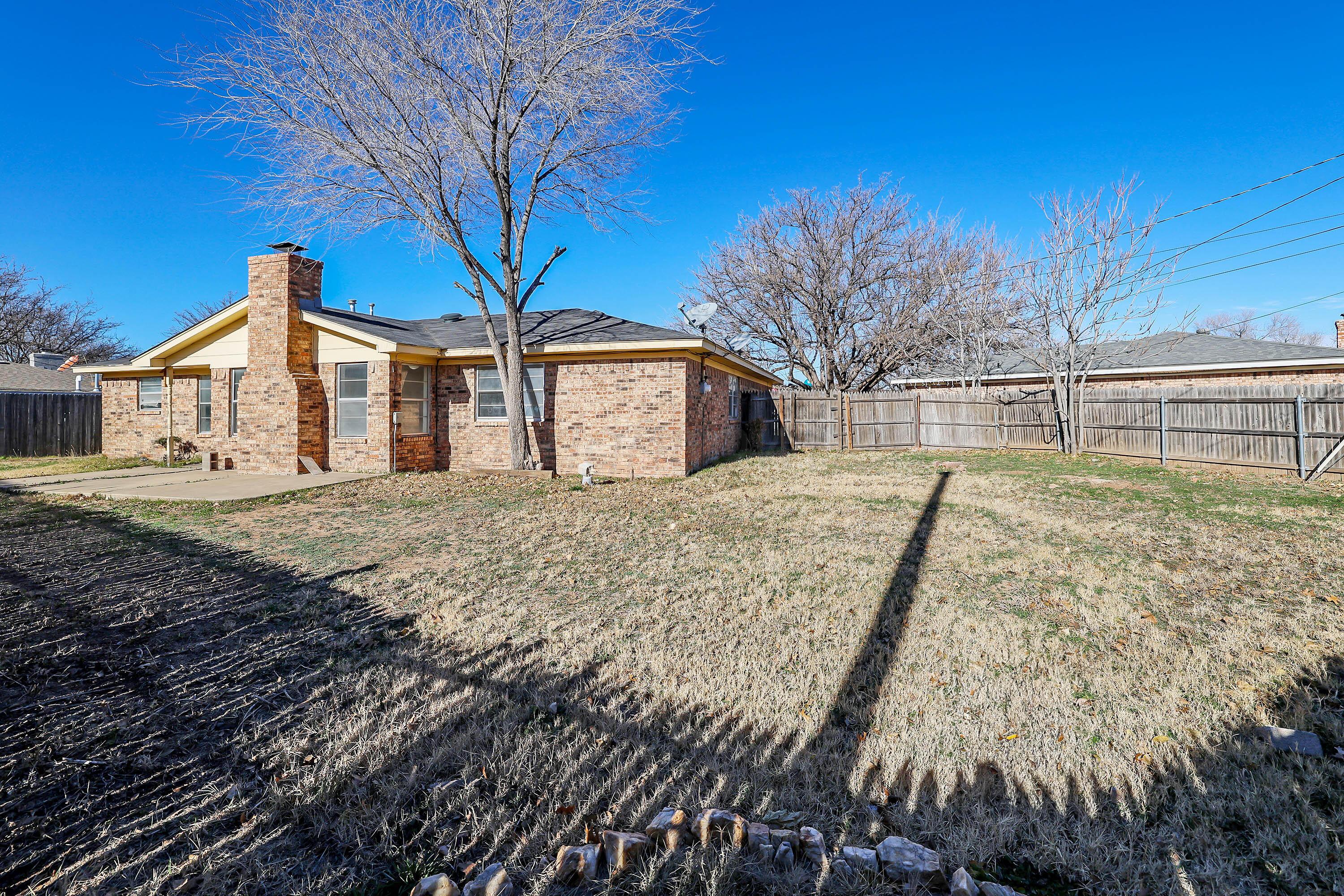 4415 Kingston Road Amarillo, TX 79109 - Photo 27 of 28 a view of a house with a yard