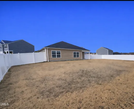 a view of backyard of house