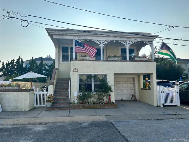a view of a house with a garage