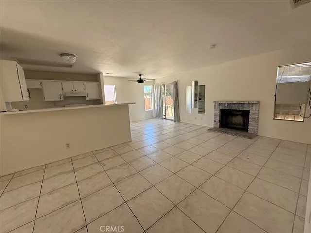 a living room with a fireplace