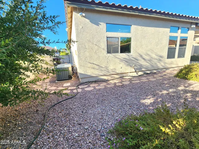 a view of roof deck with patio table and chairs