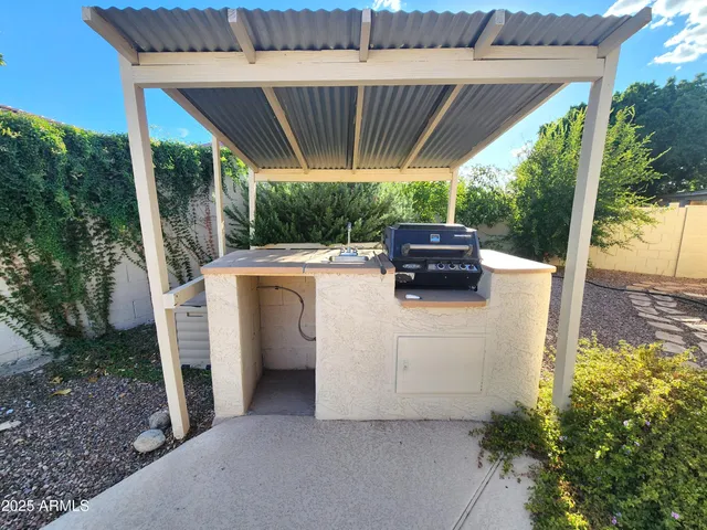 a view of a swimming pool with a patio