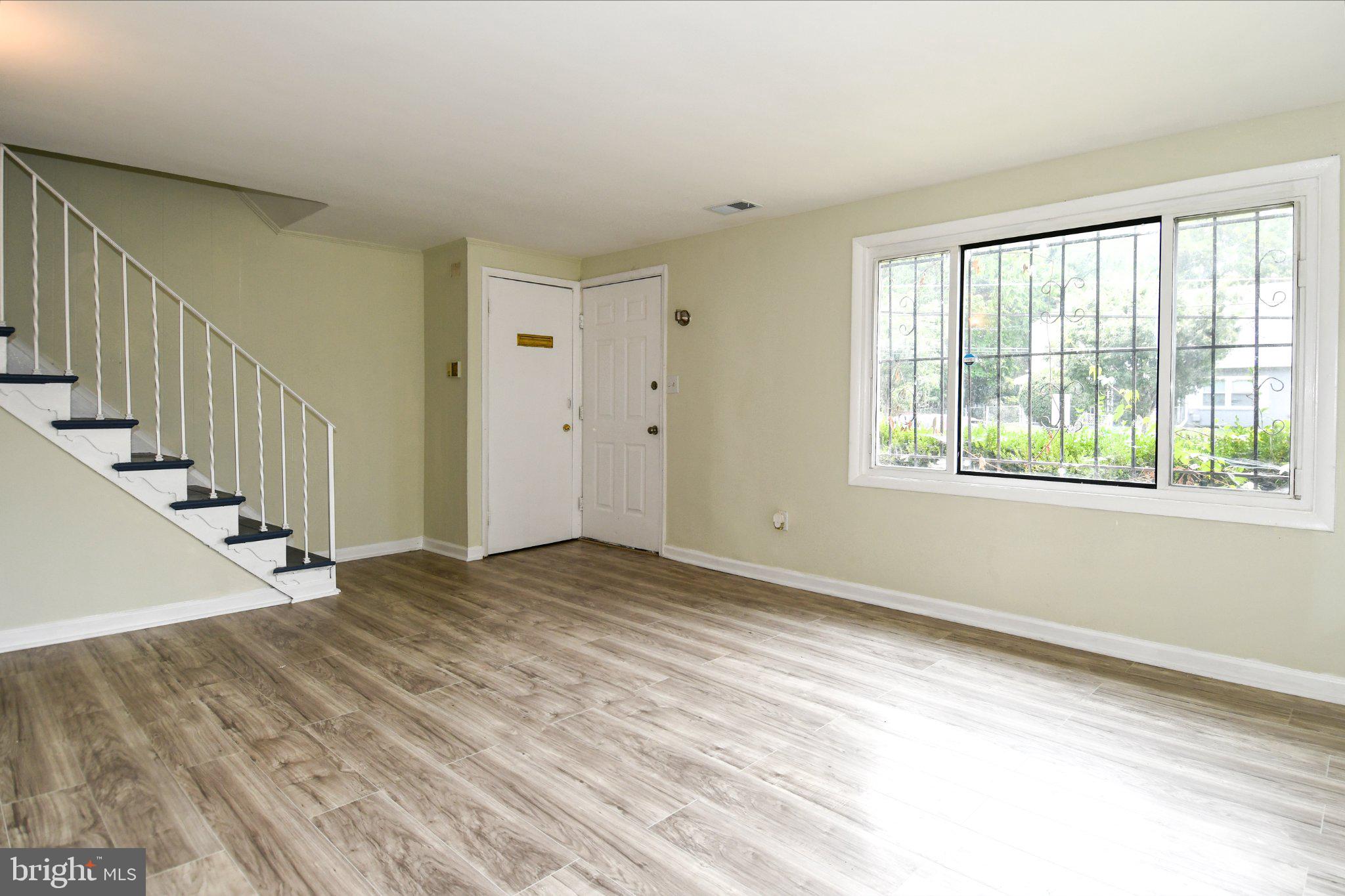 7768 Burnside Road Landover, MD 20785 - Photo 2 of 27 Bright and airy living space awaits.