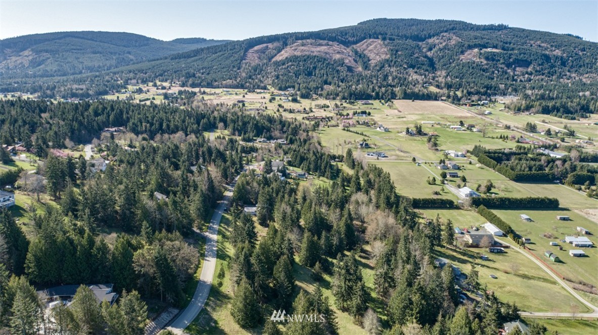 1 Fox Hollow Road Sequim, WA 98382 - Photo 3 of 20 an aerial view of mountains residential house and green space