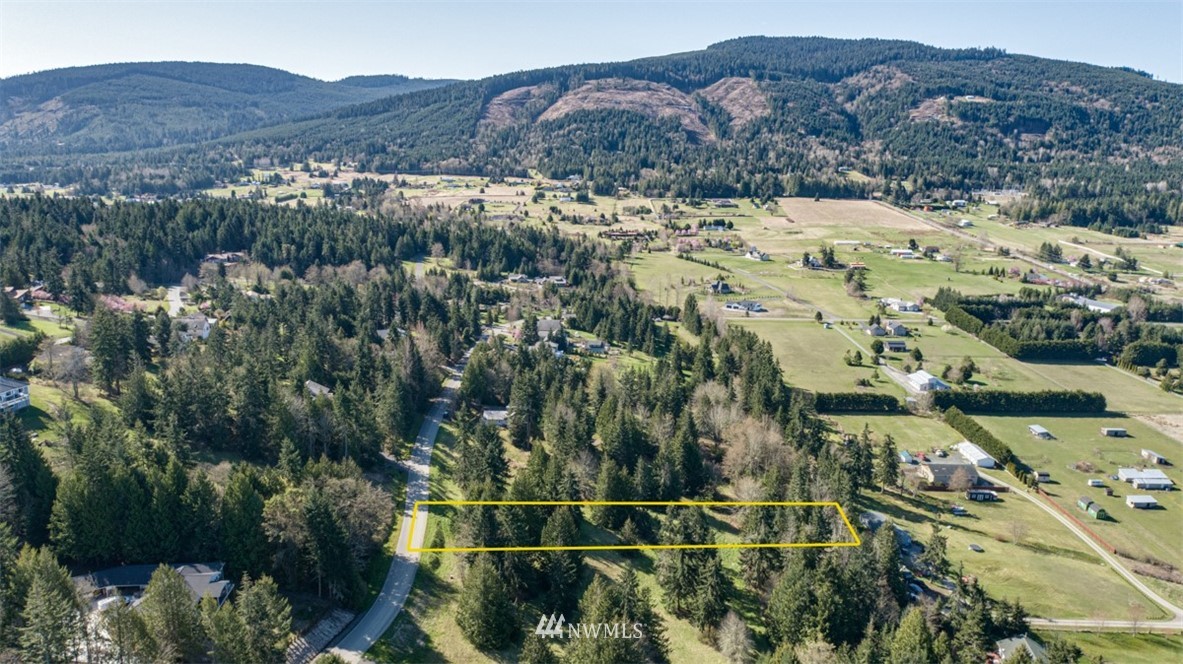 1 Fox Hollow Road Sequim, WA 98382 - Photo 9 of 20 an aerial view of mountain with residential house and mountain view