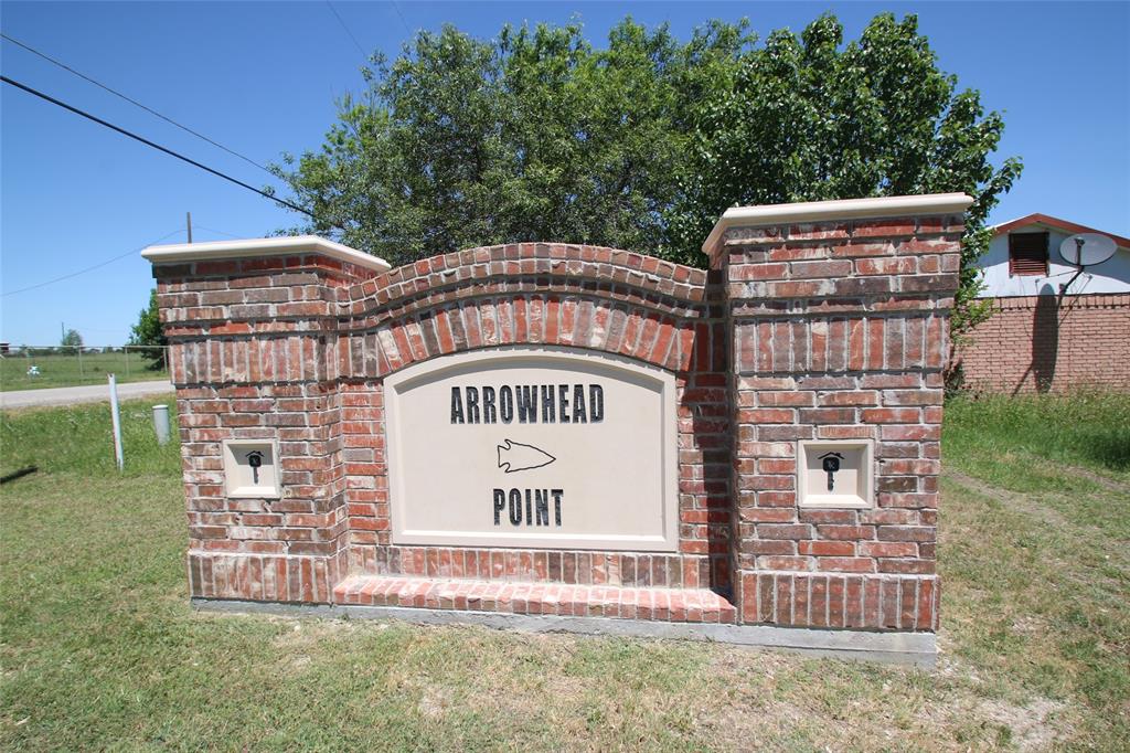 156 Crossbow Court Weatherford, TX 76088 - Photo 23 of 23 a sign on the side of a building