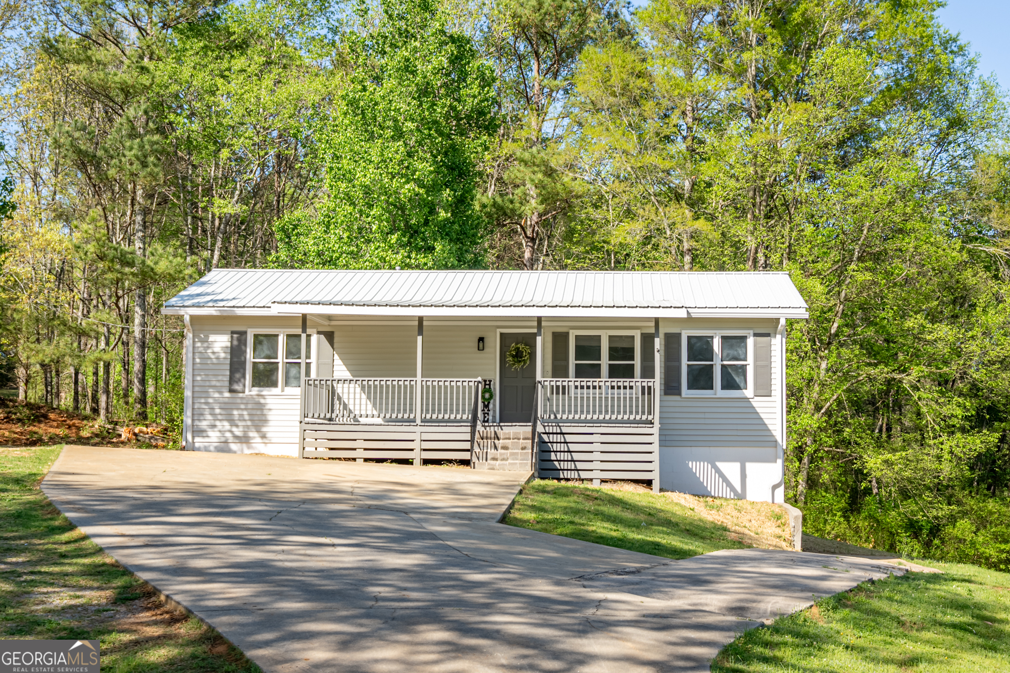 1141 Chulio Road Southeast Rome, GA 30161 - Photo 1 of 1 front view of a house with a yard