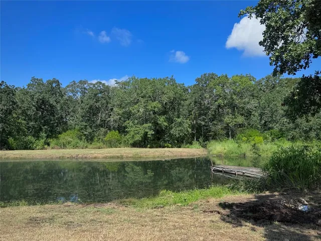 a view of a lake with outdoor space