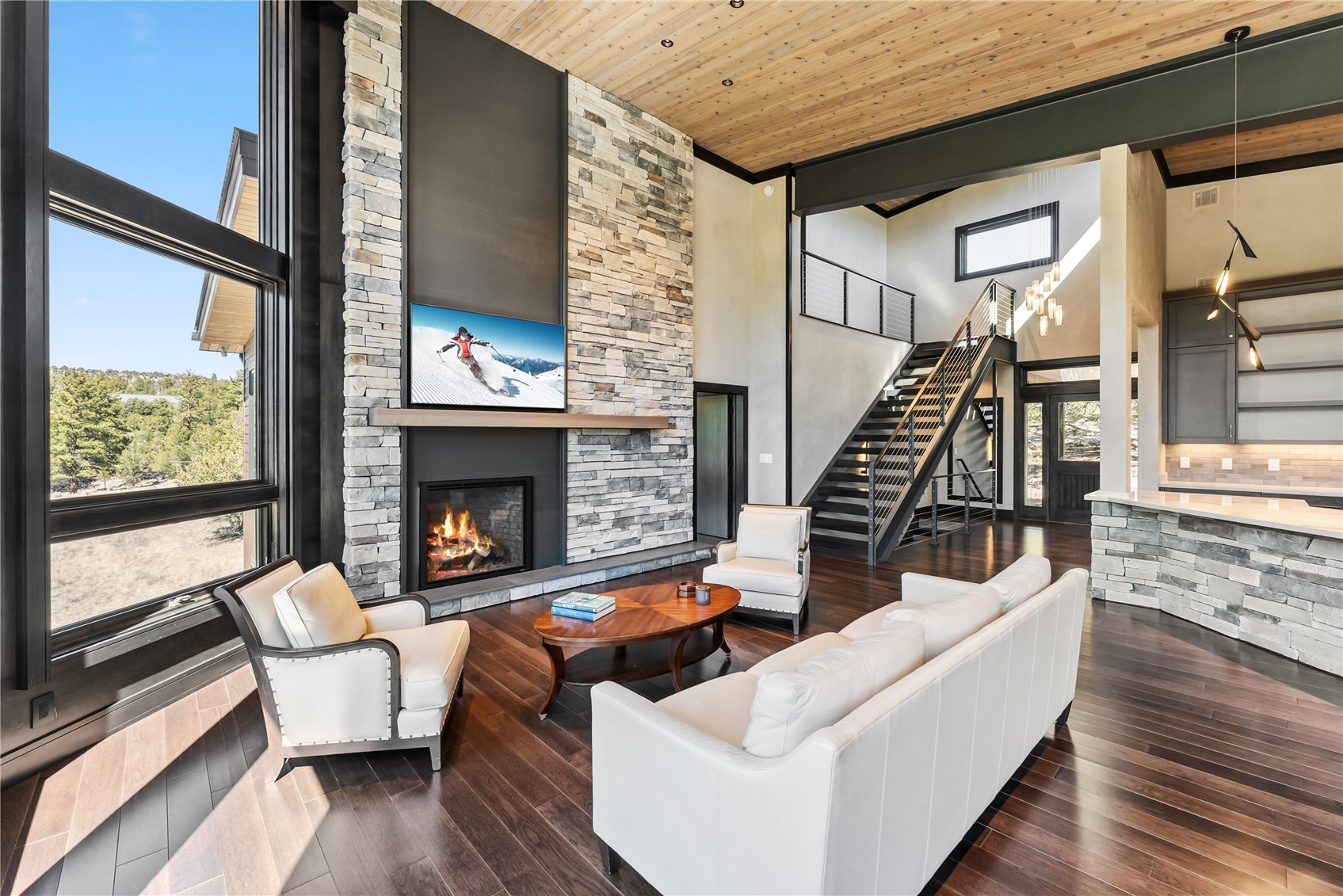 21261 Broadview Road Nathrop, CO 81236 - Photo 9 of 49 a living room with furniture and a fireplace