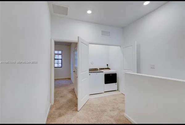 a view of utility room with washer and dryer