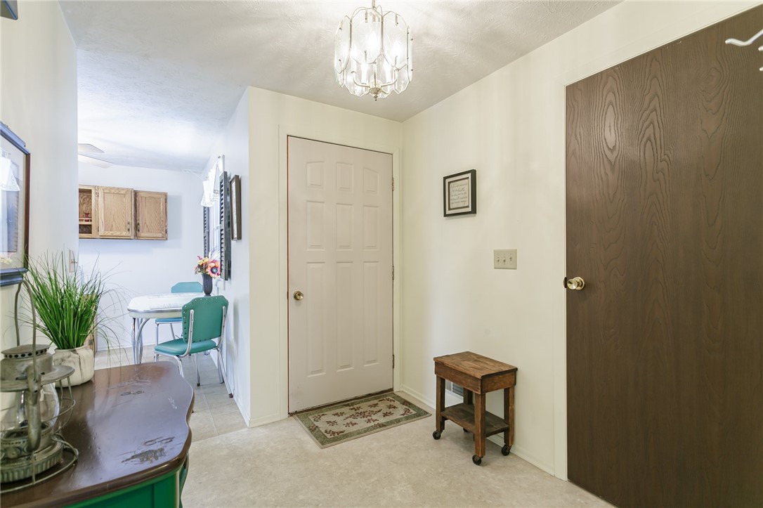 516 Gilmore Road Clarkson, NY 14420 - Photo 3 of 31 Front entry way with coat closet leading into the