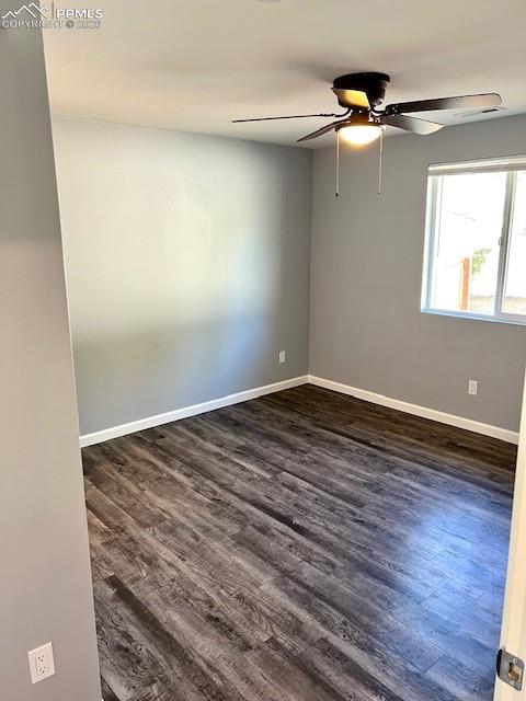 734 East Rio Grande Street Colorado Springs, CO 80903 - Photo 7 of 30 a view of empty room with wooden floor