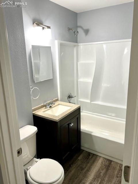 734 East Rio Grande Street Colorado Springs, CO 80903 - Photo 9 of 30 a bathroom with a sink and mirror with toilet